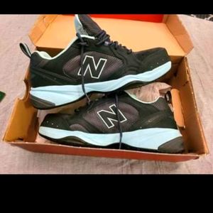 Womens 8.5 steel toe New Balance tennis shoes